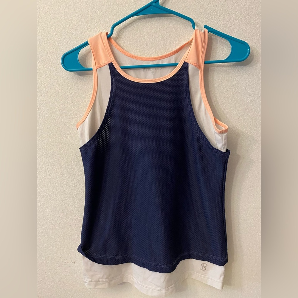 Sofibella Racerback tank with mesh layers. Size XS. Navy, white and orange.